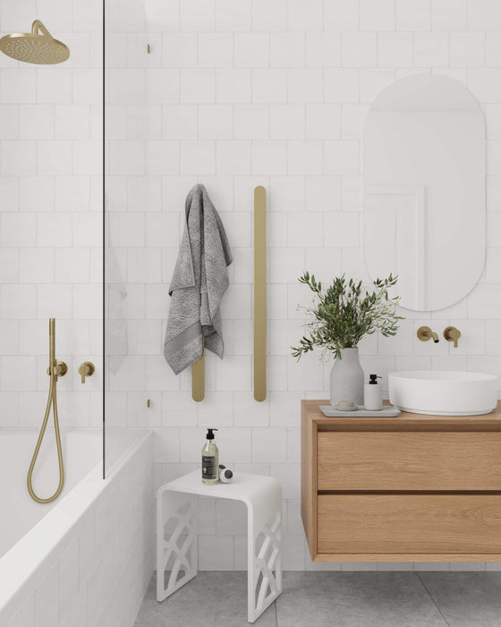 Ivy Shower Stool in a white and gold scheme bathroom