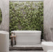 Otti Attica Bath in front of natural feature wall
